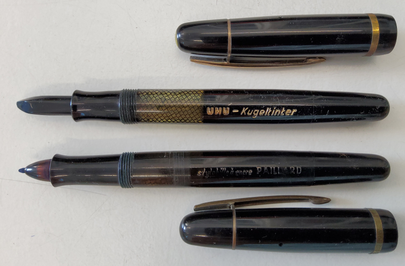 UHU-Kugeltinter der 1. Generation mit gerader Spitze (unten) und der 2. Generation mit abgewinkelter Spitze (Sammlung stgib, Bühl)