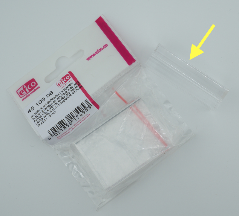 Acrylblock mit Griffmulde und Pfeil.jpg